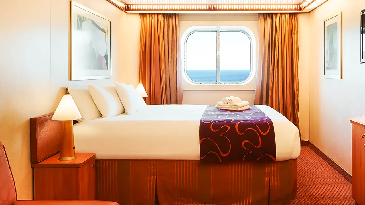 Favolosa Costa Favolosa: Luxurious cruise ship with elegant décor, comfortable cabins, and balconies. Offers premium services and modern amenities.